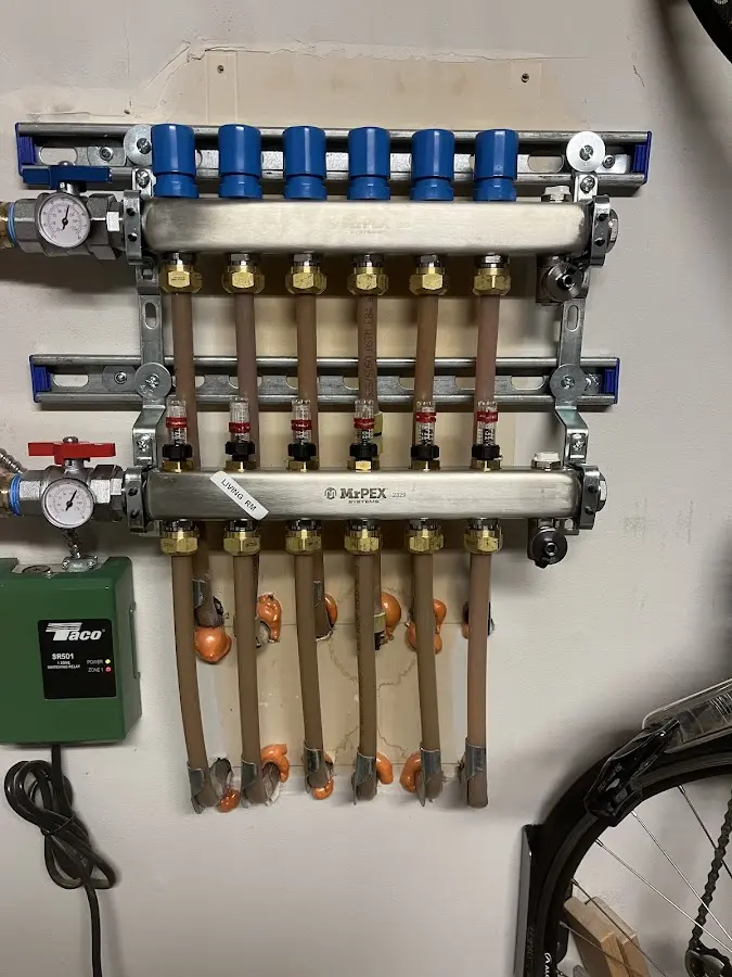 Plumber performing Gas Line Installation at a residential property in Gray