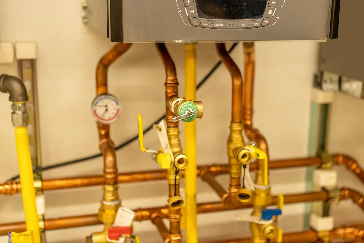 Licensed technician providing Water Heater Installation for a homeowner in Gray